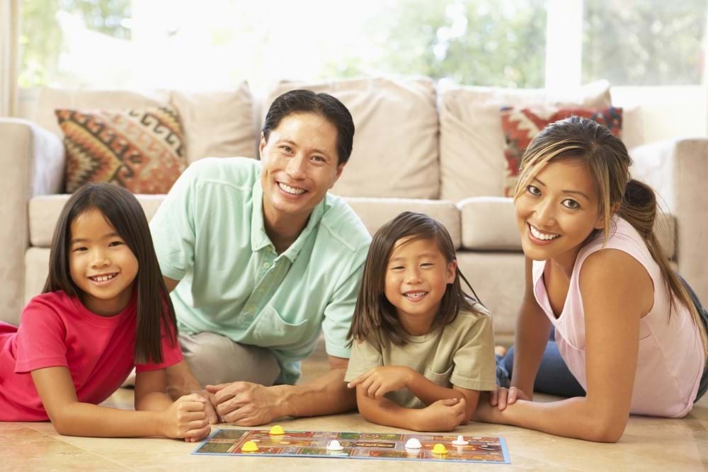 family-playing-board-game-at-home-1000x667.jpg