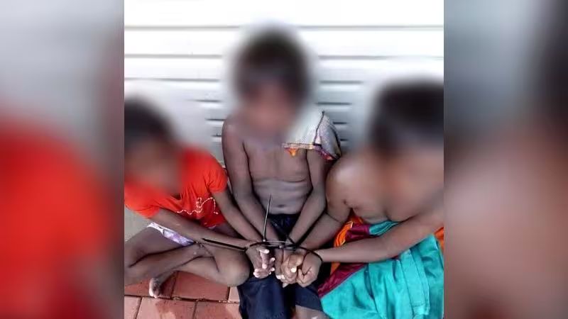 three-children-with-their-hands-cable-tied-in-a-broome-yard-HGMDSBXOSZHZTOAXW2G3MPJJNU.jpg